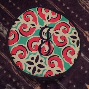 Possible CD case, makeup bag, jewelry case